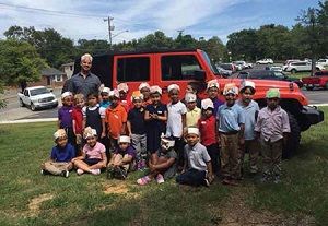 Moss Elementary kindergarten students celebrate the letter J for &ldquo;jeep.&rdquo;Moss Elementary kindergarten students use Learning alive Plus to build sentences.